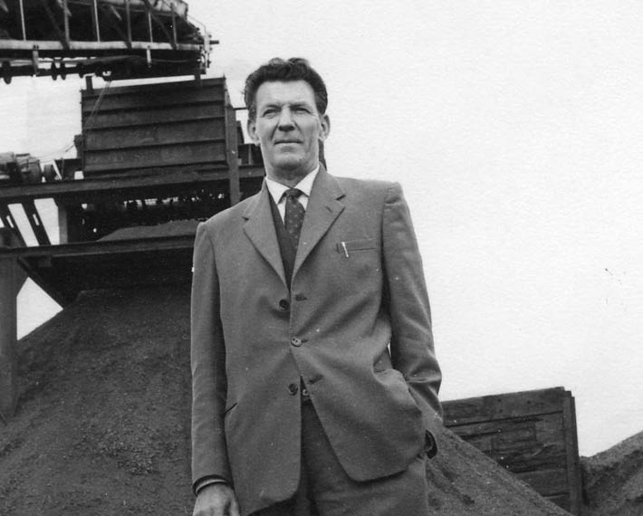 John Day outside a depot