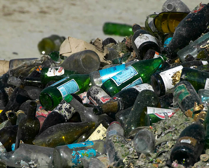 Smashed up glass bottles in a pile