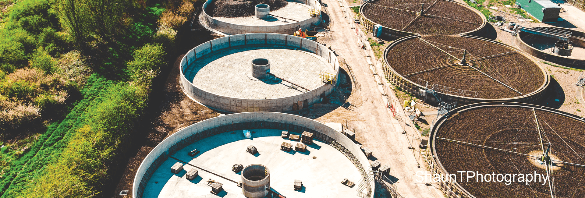 Construction of 3 water filtration tanks taken from a drone.