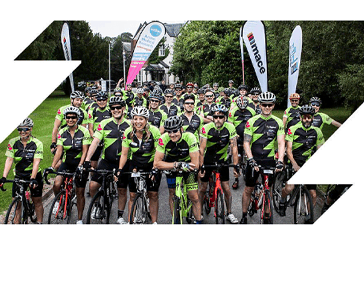 big group of cyclists starting a charity ride