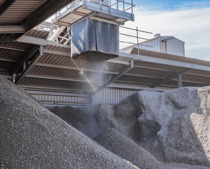 Piles of IBA with a shoot for the material to be put into the piles